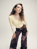 rhombifer bodysuit butter yellow con transparencias mesh look completo