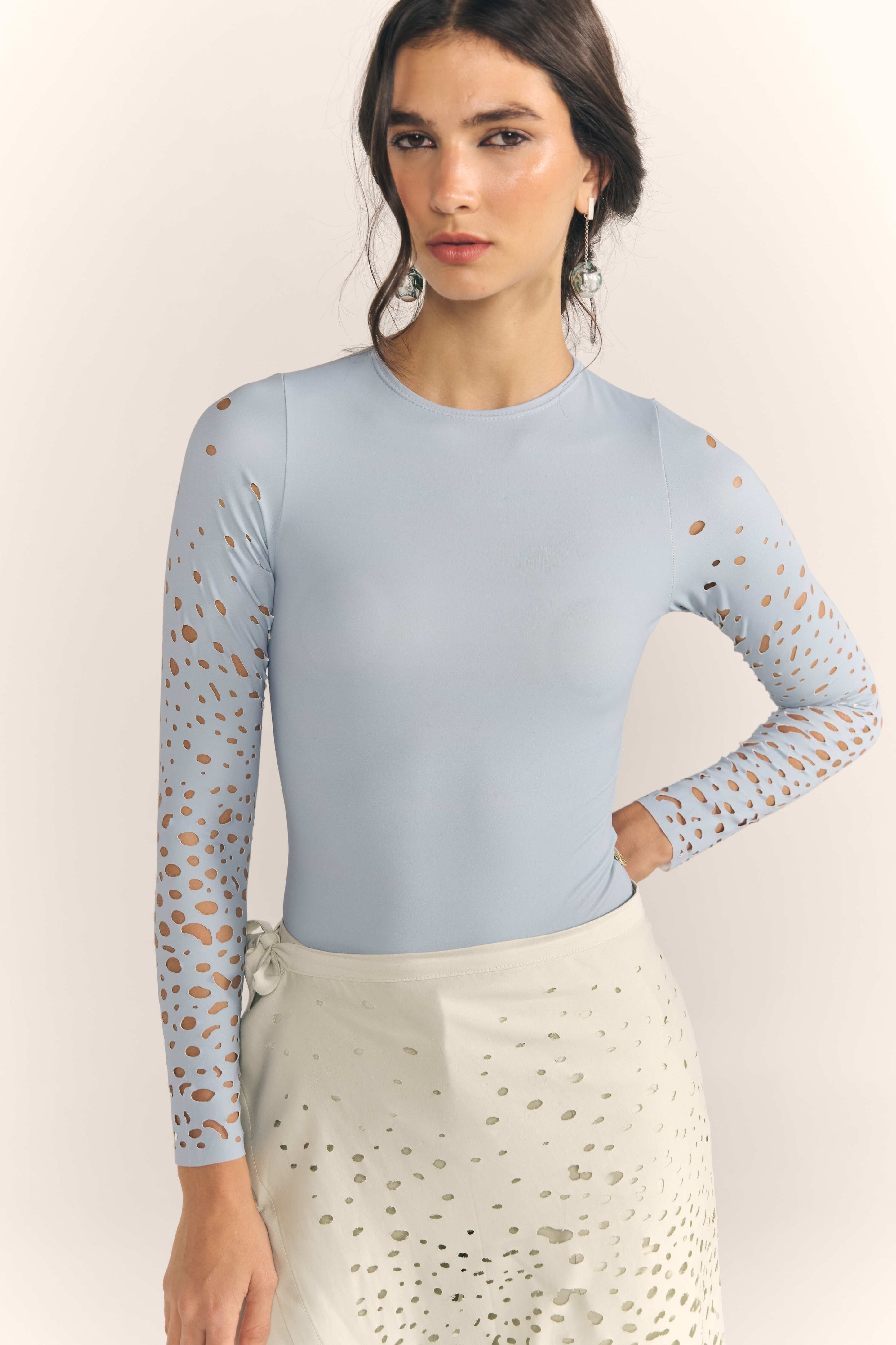 Body baby blue de diseño latinoamericano.
