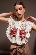 Silvia Top en jacquard floral con boleros y detalles bordados en cordón.